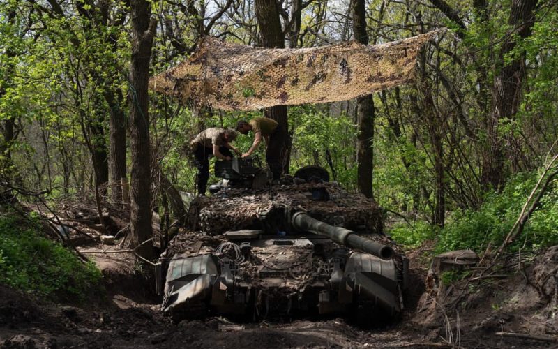 Ukrainian defender on a tank. By Evgeniy Maloletka